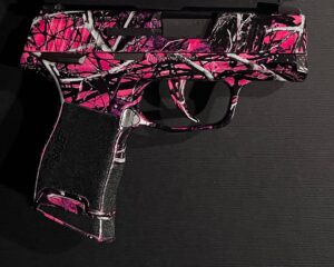 Customized Sig Sauer P365 with manual safety in Muddy Girl hydrographic and cerakote