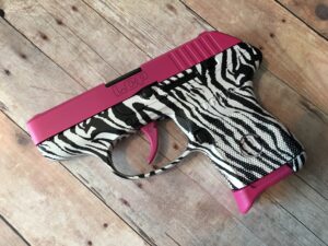 Customized Ruger LCP in hydrographic and cerakote for sale pink guns firearms and pistols