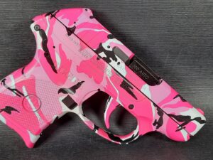 Fully customized ruger 380 lcp pink camo finish, designed for concealed carry.