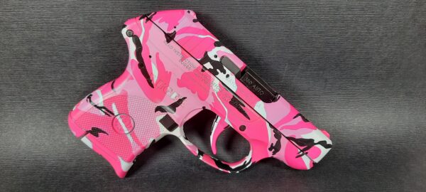 Fully customized ruger 380 lcp pink camo finish, designed for concealed carry.