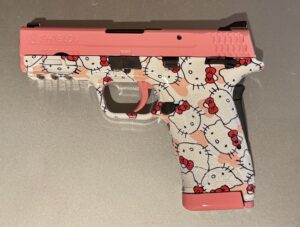 Customized Hello Kitty firearm with Pink accent upper slide